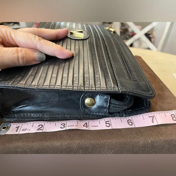 Mario Valentino Black and Gold Clutch with Elegant Wristlet